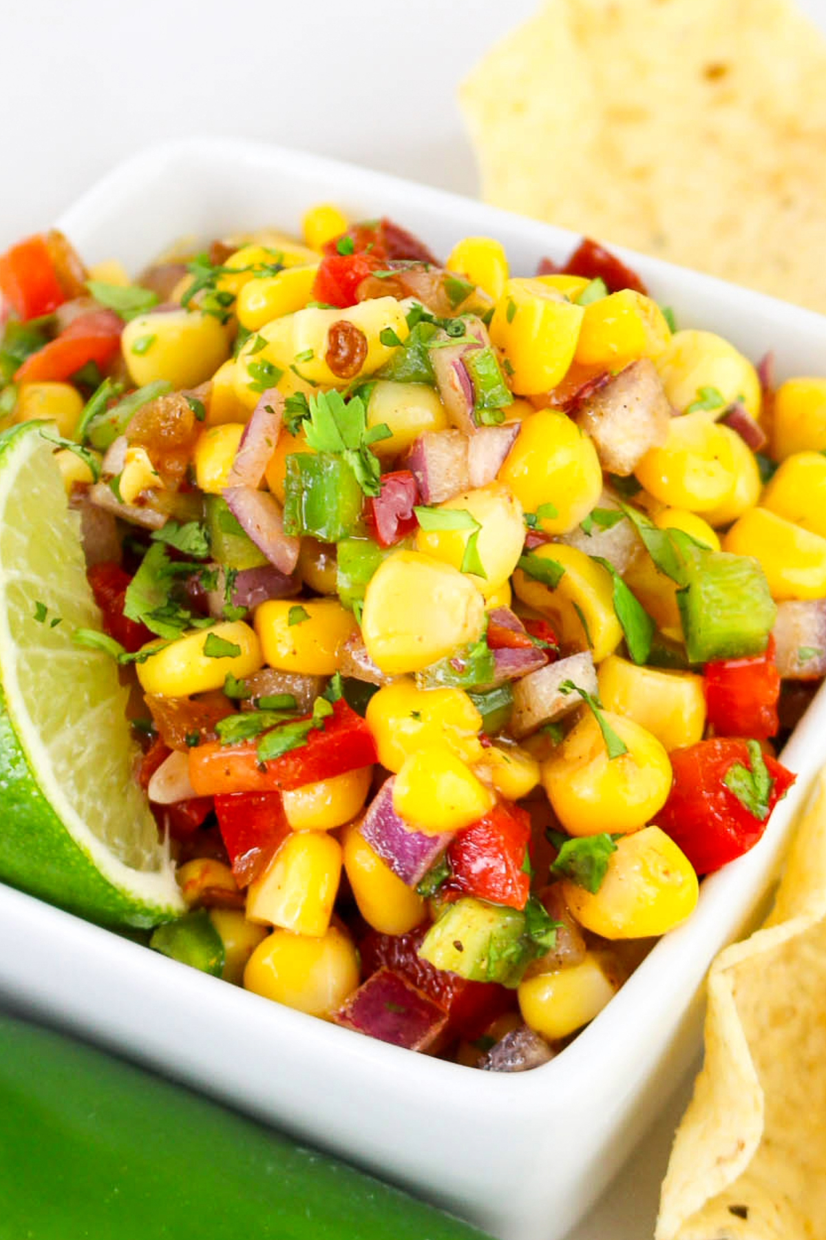 Corn dip with cilantro and peppers. 